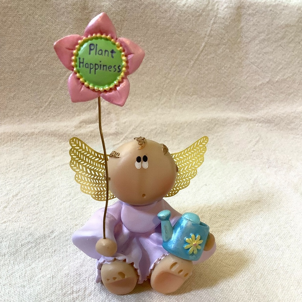 Angel Cheeks Figurine